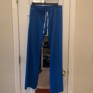 Set of Figs scrubs in Royal Blue (bleach spot on back of top)